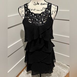 Black cocktail dress with beaded design from SLNY
